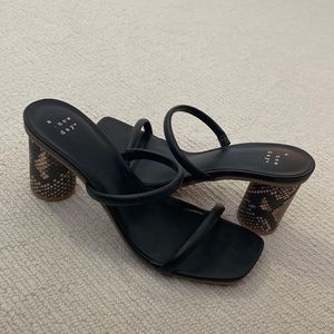 Black snake skin heels